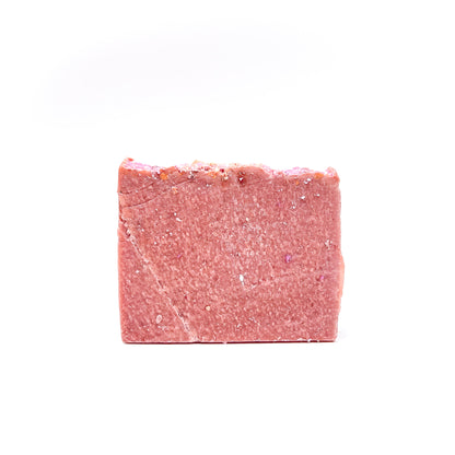 A bar of pink blush colored handmade soap from Rusted Acre Soap Company.