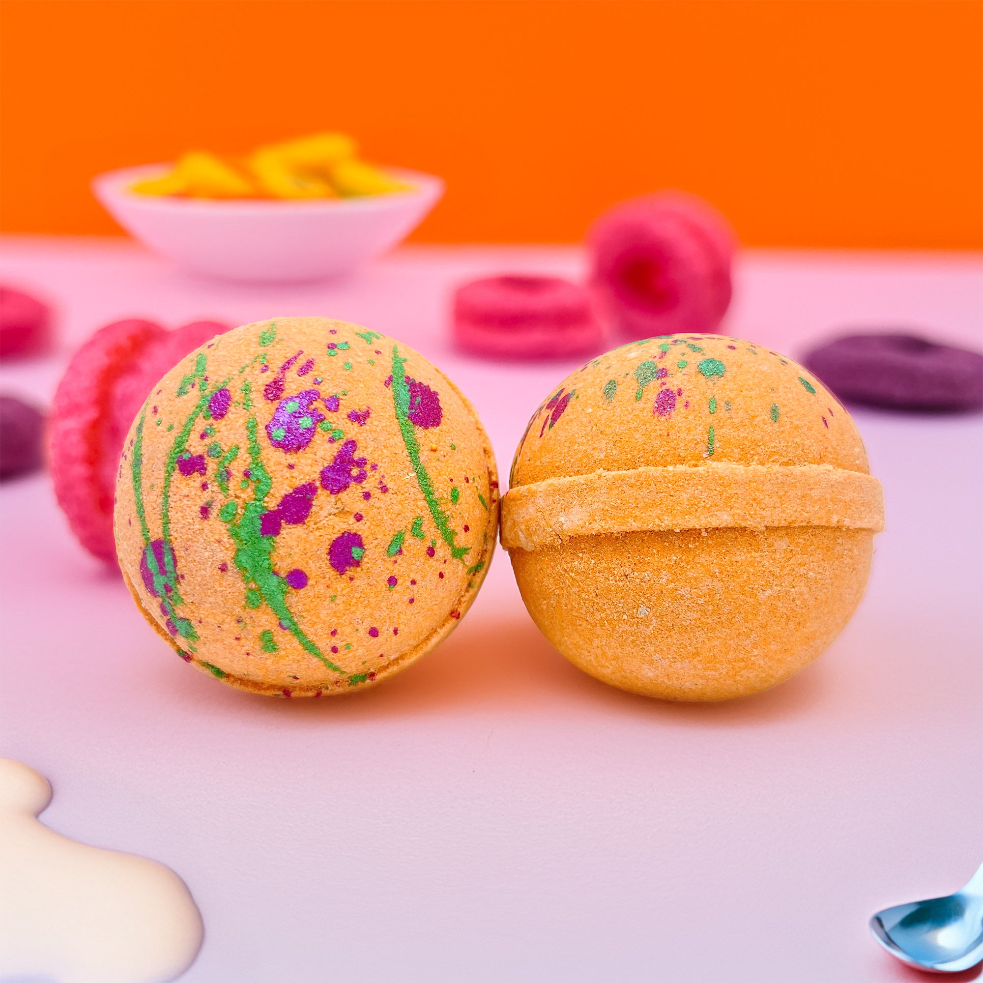 Two fruity cereal bath bombs made by Rusted Acre Soap Company.