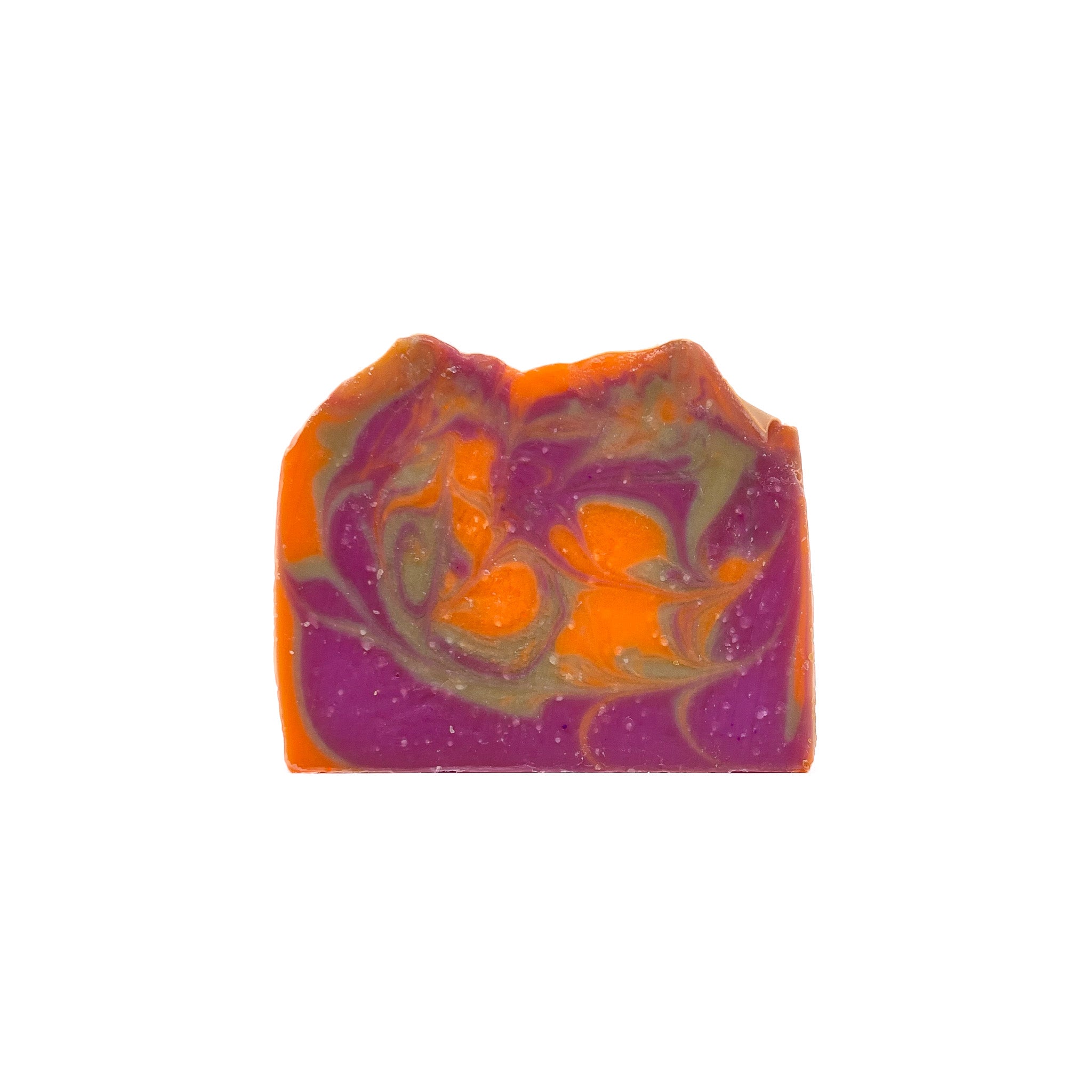 A handmade fruity cereal bar soap from Rusted Acre Soap Co. Colors are right purple, orange, and green swirled. 