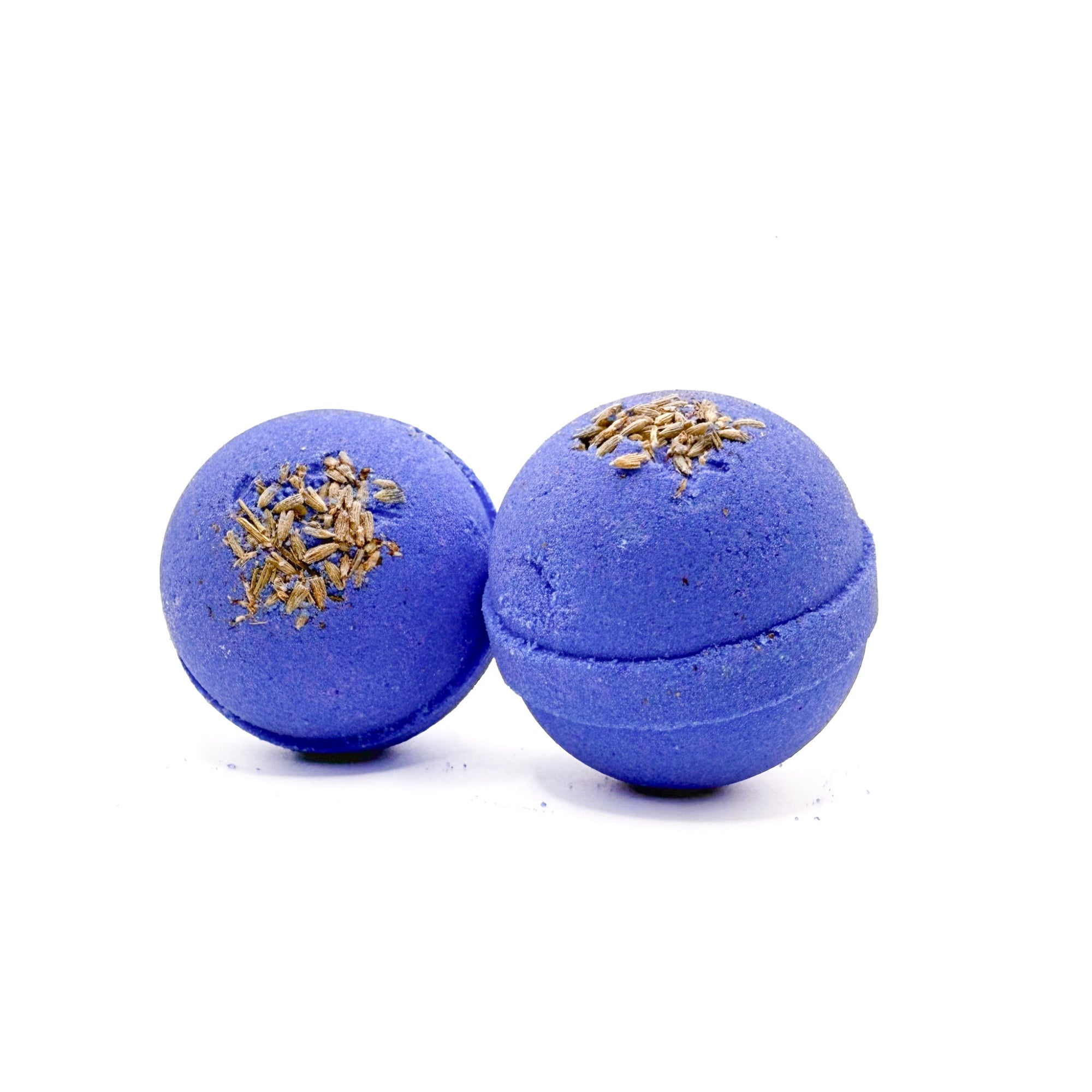 Two purple lavender bath bombs handmade by Rusted Acre Soap Company.