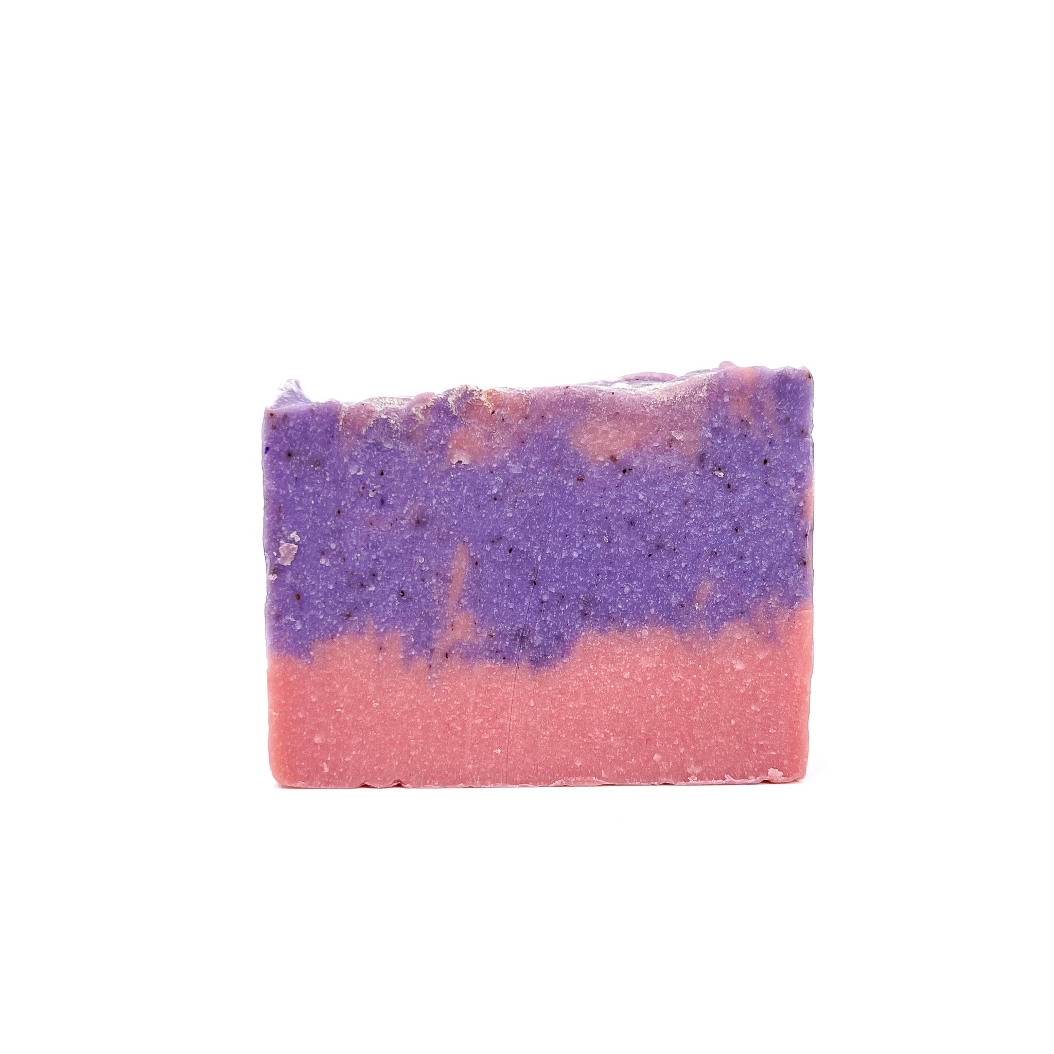 A bar of raspberry vanilla handmade soap. Color is pink bottom, purple and pink swirled upper. Topped with shimmer.