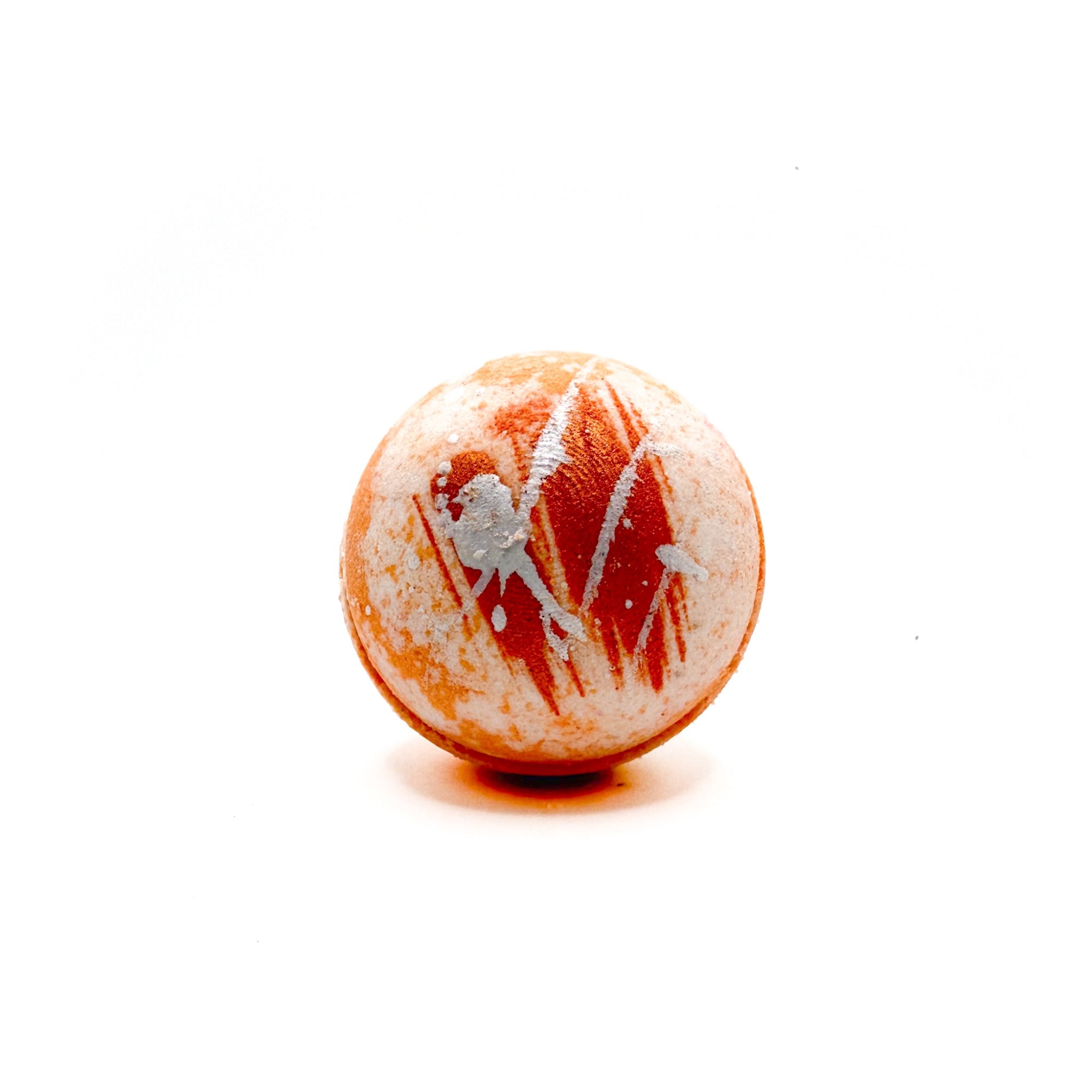 Round orange and white swirled bath bomb streaked with sliver and orange mica. 